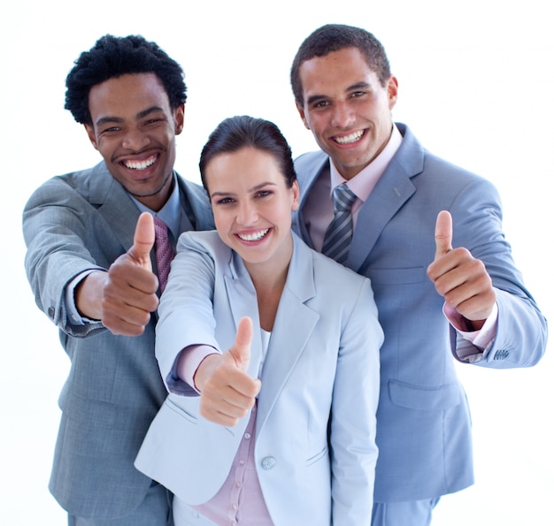 Close-up of happy business team with thumbs up