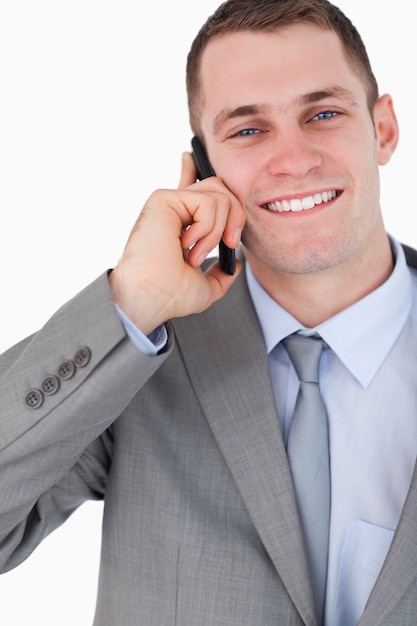 Close up of happy businessman on the phone