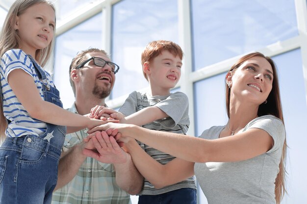 Close up a happy family looks forward to something