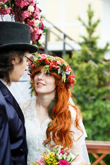 Close-up of happy young wedding couple