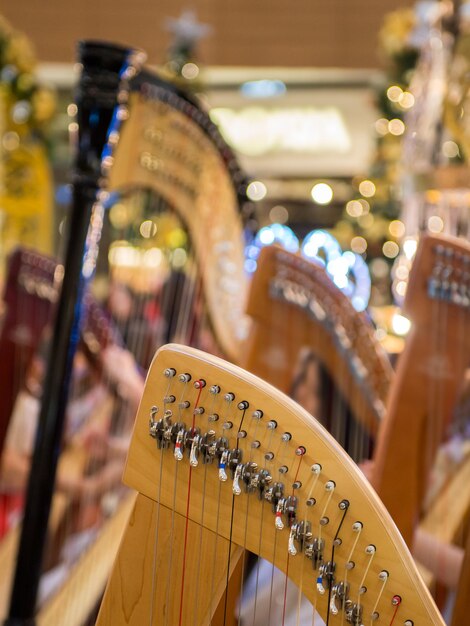 Close-up of harps for sale