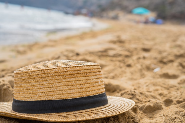 Close- up of  hat  on the beach