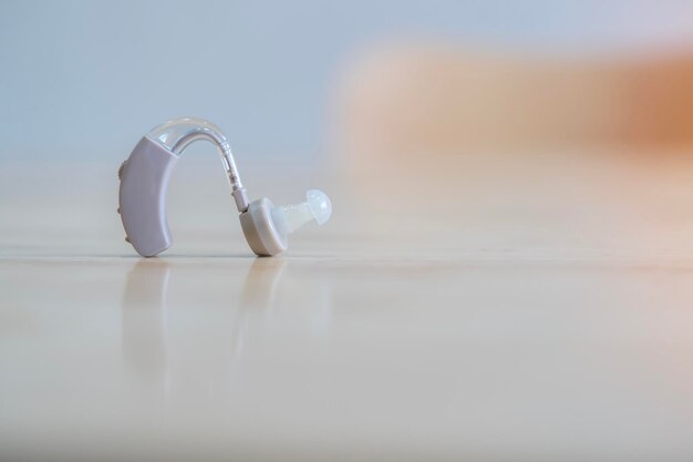 Close up of hearing aid for the treatment of deafness and hearing loss in humans