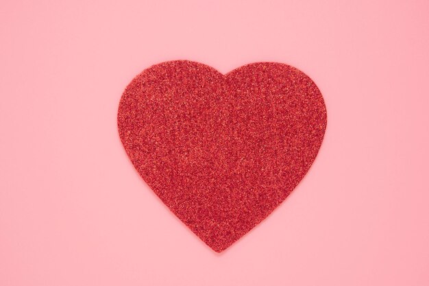 Photo close-up of heart shape over pink background