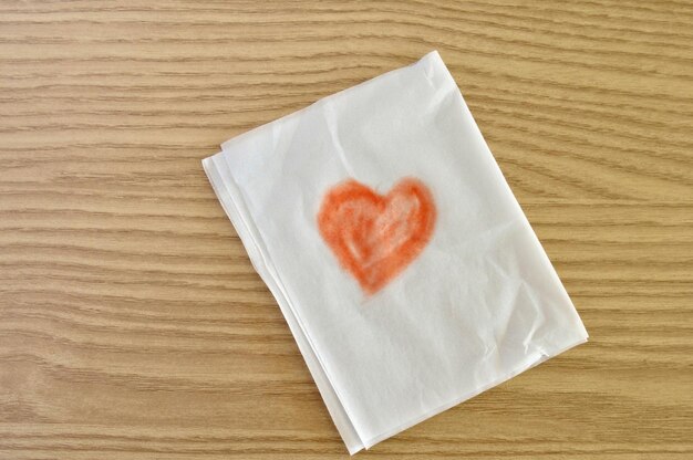 Close-up of heart shape on table