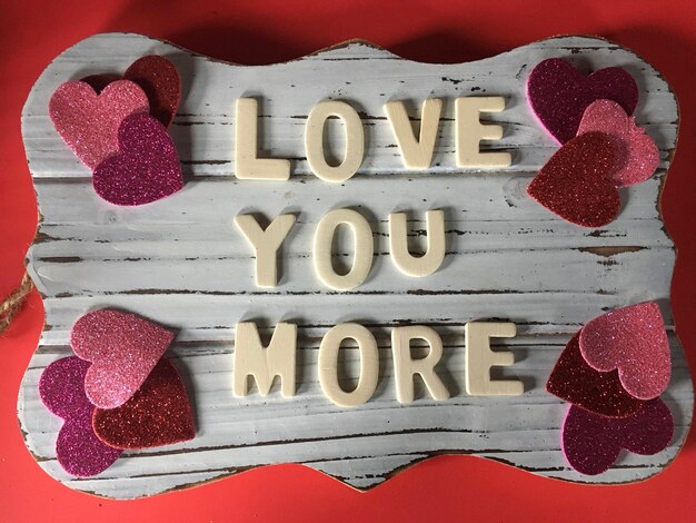 Photo close-up of heart shape with text love you more