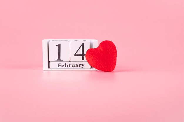 Photo close-up of heart shape with text on pink background