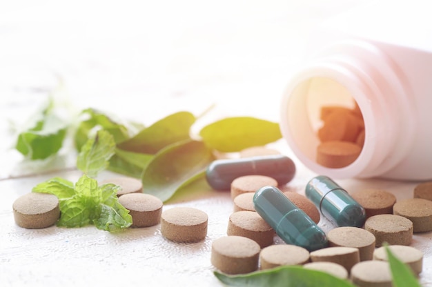 Photo close-up of herbal medicines on table