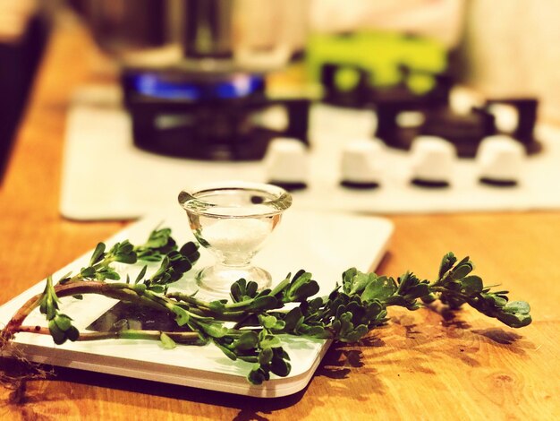Close-up of herbs on table