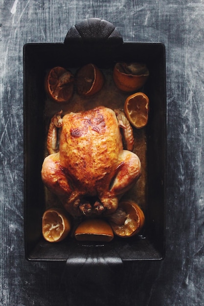 Photo close-up high angle view of roasted chicken