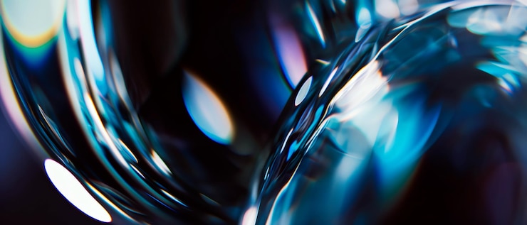Photo close up of holographic glass shapes with dark background and colorful reflections abstract pattern