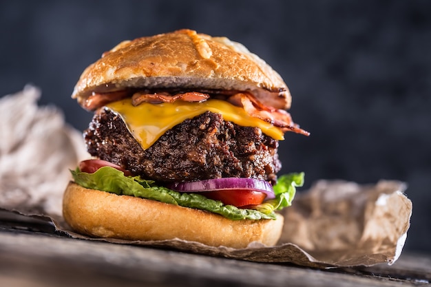 Close-up home made beef burger on wooden table