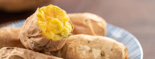 Close up of homemade delicious roasted sweet potato in a plate for eating, famous Taiwanese food.