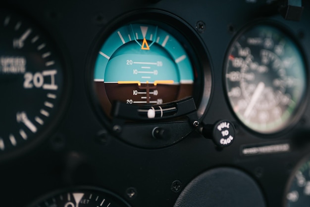 Photo close-up of horizon instrument in a helicopter or airplane cockpit