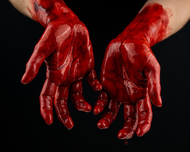 Photo close-up of human hand against black background