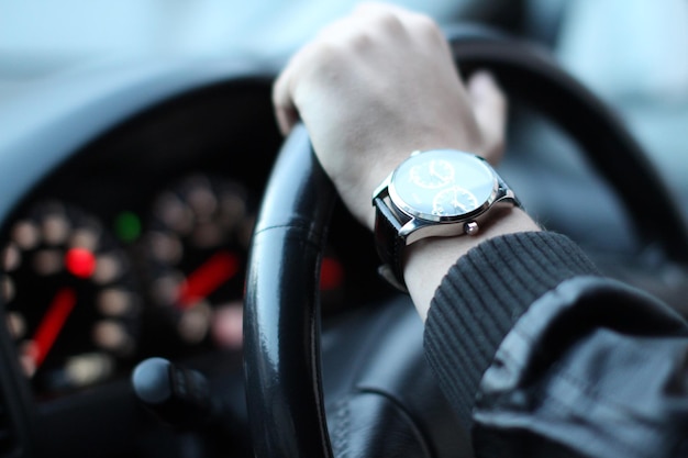 Close-up of human hand against blurred background