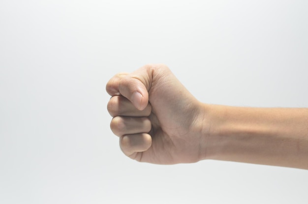 Foto close-up di una mano umana su uno sfondo bianco