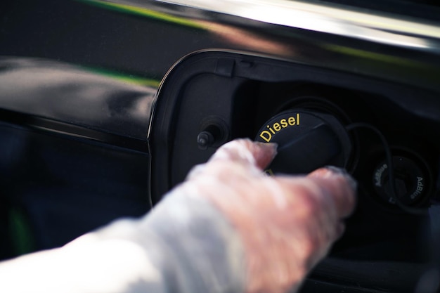 Close-up of human hand in car