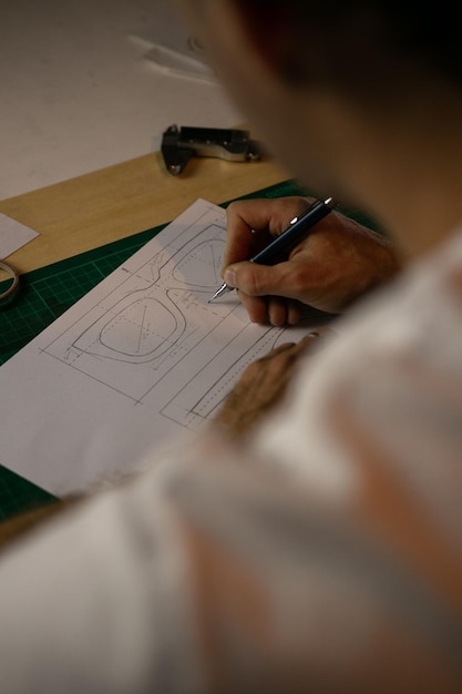 close-up of human hand holding paper