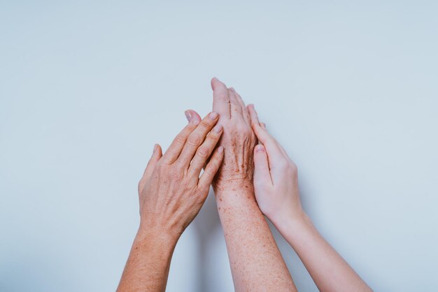 Close-up of human hand over white background