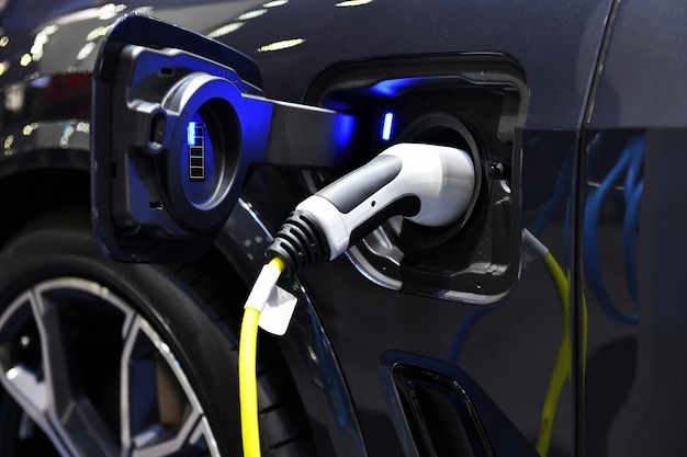 Close up Hybrid car on recharge