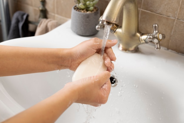 Photo close up on hygienic hand washing