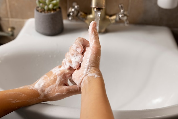 Photo close up on hygienic hand washing