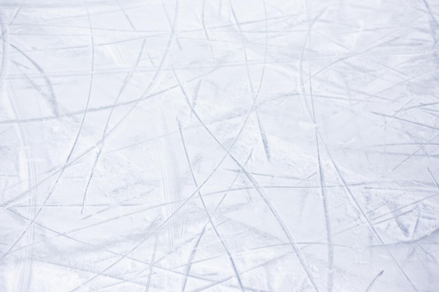 Close up of ice background with marks from skating and hockey