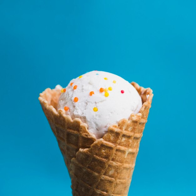 Close-up of ice cream against blue background