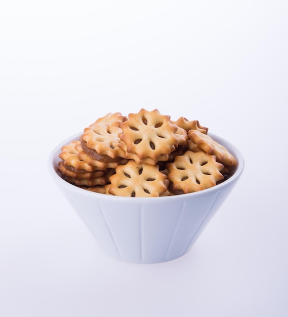 Photo close-up of ice cream in bowl against white background