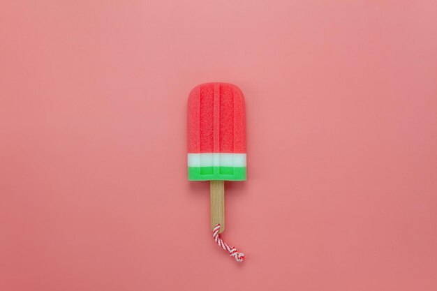 Close-up of ice cream over pink background