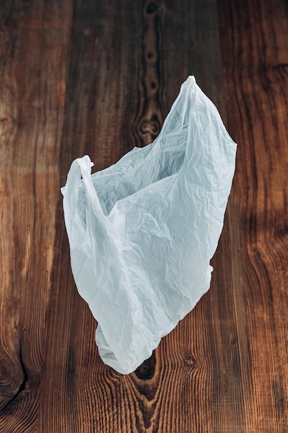 Photo close-up of ice plastic bag against black background