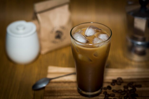 Close-up of iced coffee on cutting board