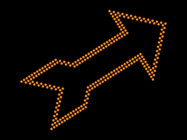 Photo close-up of illuminated arrow symbol over black background