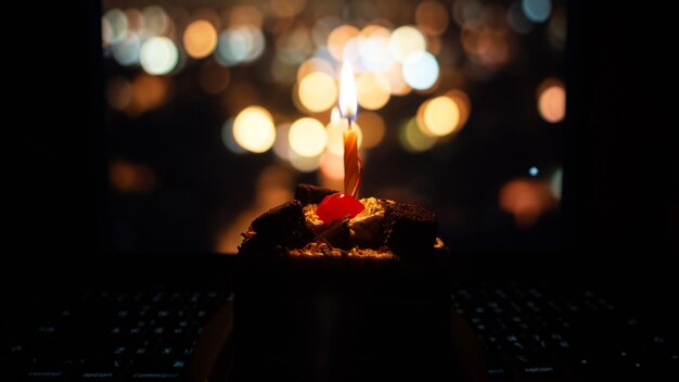 Close-up of illuminated cake