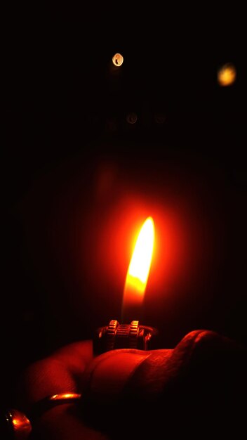 Close-up of illuminated candle