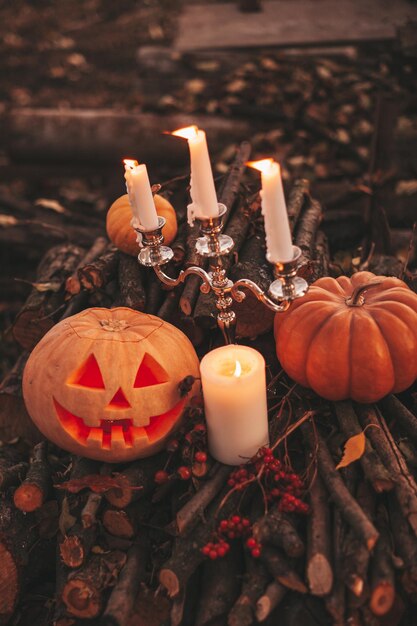 Close-up of illuminated candles on table