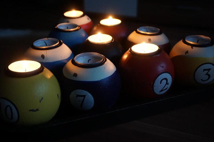 Photo close-up of illuminated candles on table