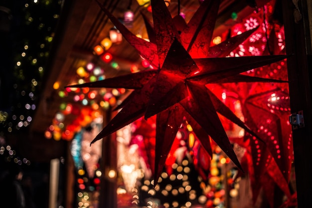 Photo close-up of illuminated christmas decoration at night