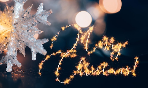 Photo close-up of illuminated christmas tree at night