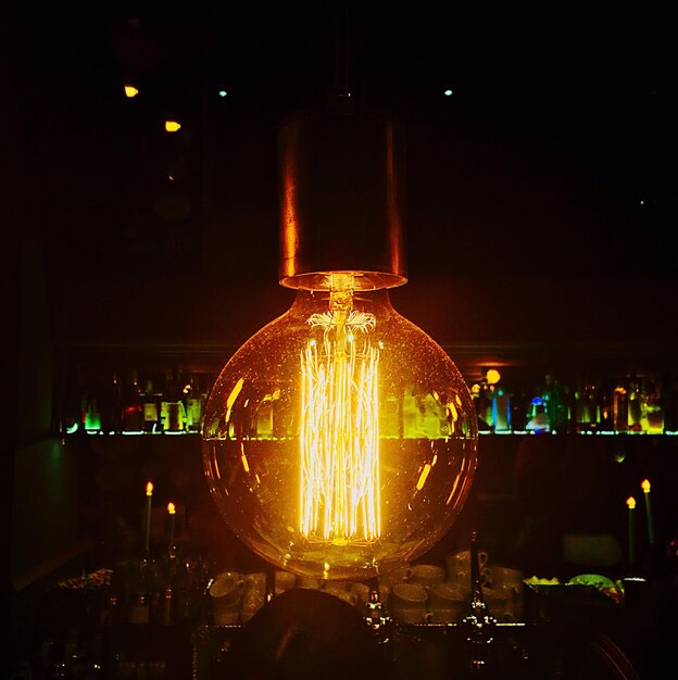 Close-up of illuminated electric bulb