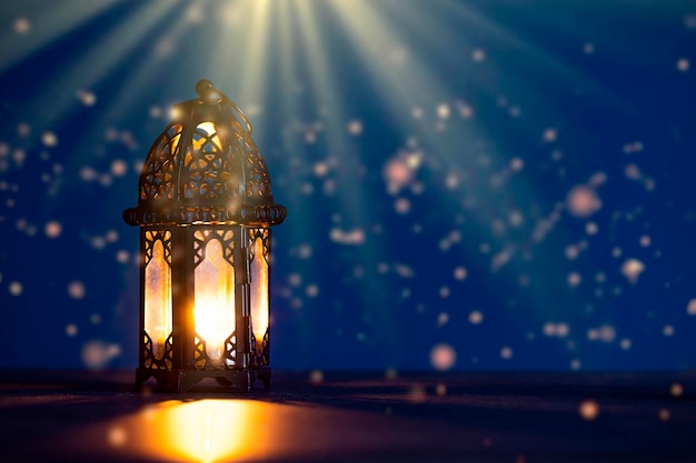 close-up of illuminated lamp on table