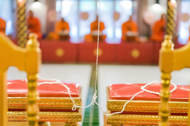 Close-up of illuminated lanterns hanging in temple