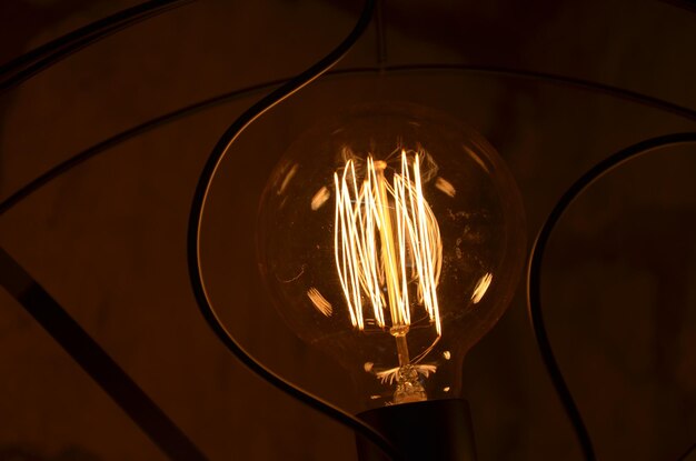 Close-up of illuminated light bulb