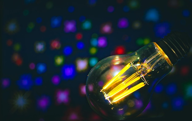 Close-up of illuminated light bulb