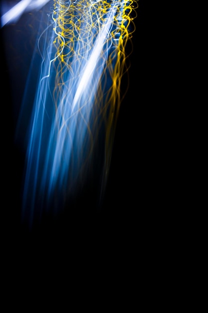 close-up of illuminated light trail against black background