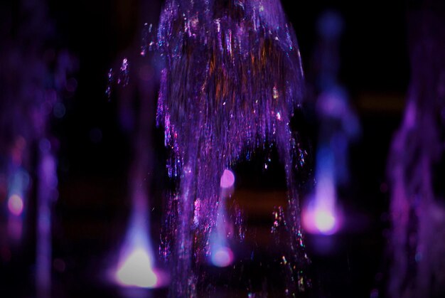 Photo close-up of illuminated lights at night