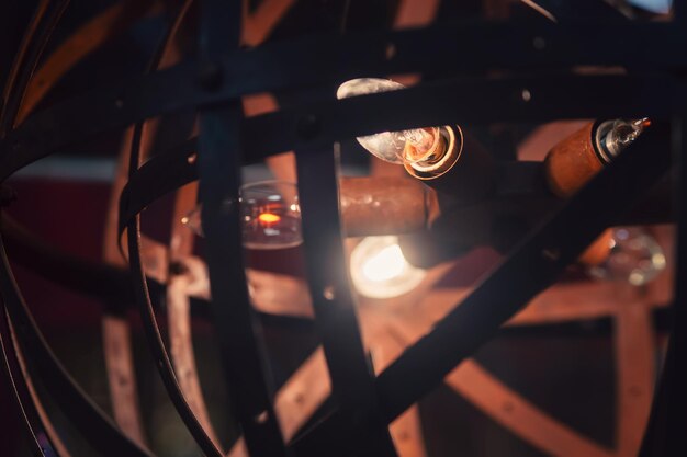 Photo close-up of illuminated metal grate