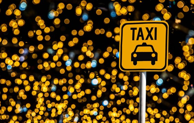 Photo close-up of illuminated sign on street at night