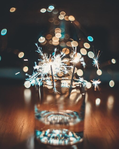 Close-up of illuminated sparklers at night